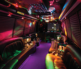 A large party bus with all the bellsand whistles, leather seats and a limo style couch for your passengers to party in style.  Equipped with minibars, tv, sound systems, internet and more!